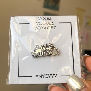 LOUIS VUITTON Limited pin from Volez Voguez Voyagez